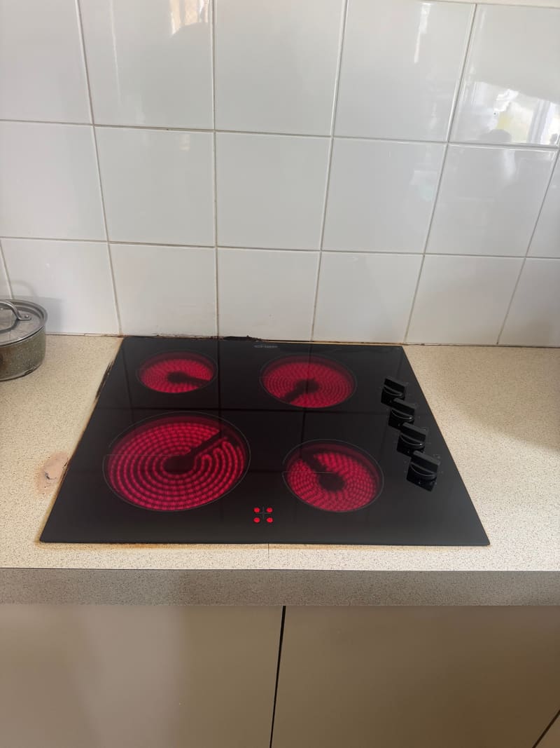 Electric ceramic cooktop with all four elements switched on